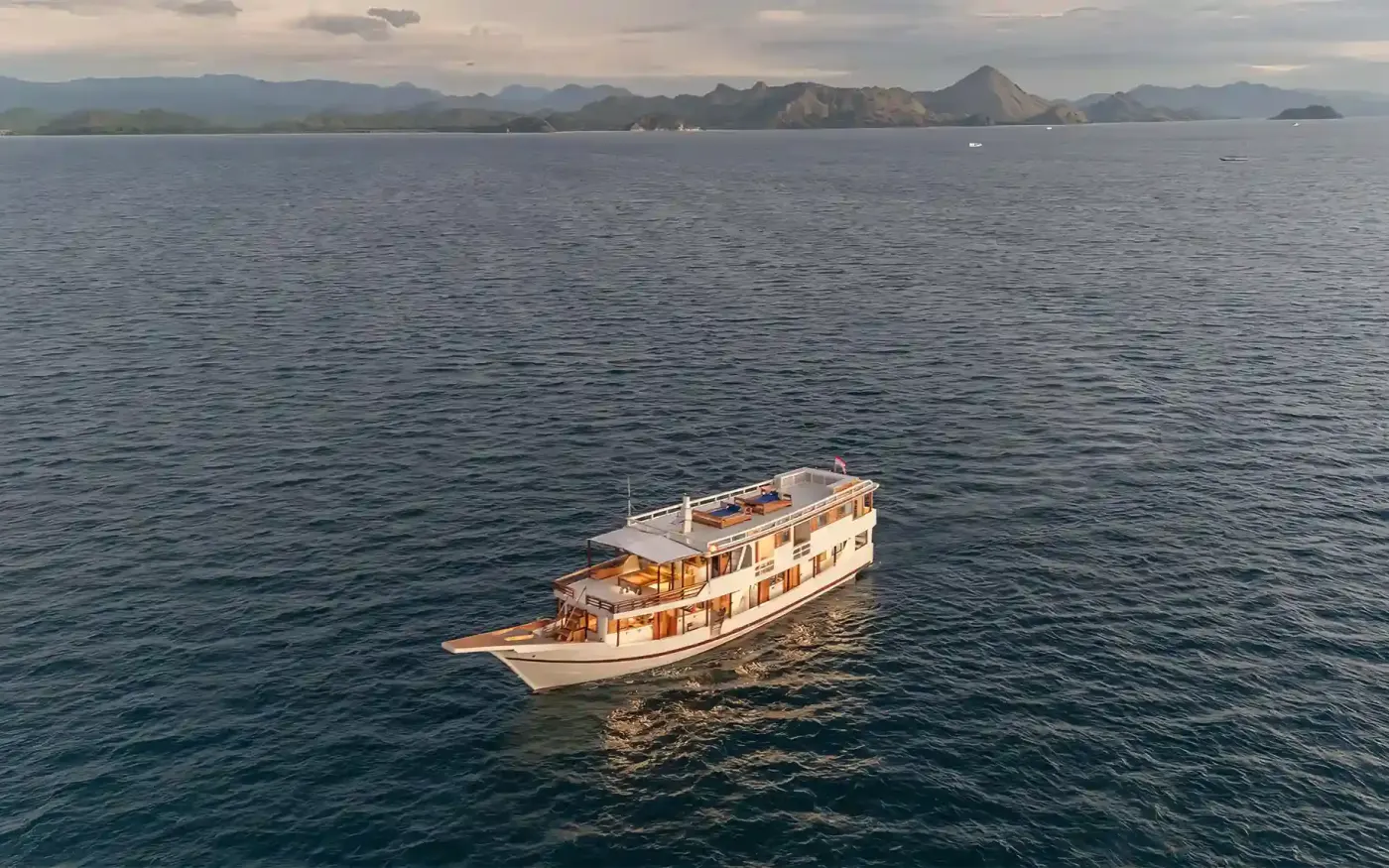 Aerial view of Ayvara Cruise sailing off the Komodo coast