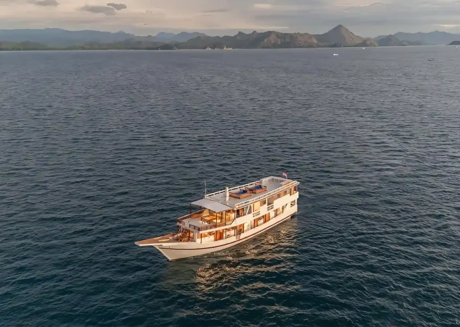 Aerial view of Ayvara Cruise sailing off the Komodo coast
