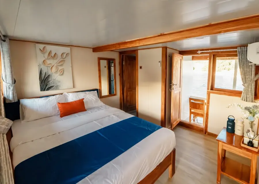 Deluxe Cabin on Ayvara Cruise with the door to its private balcony