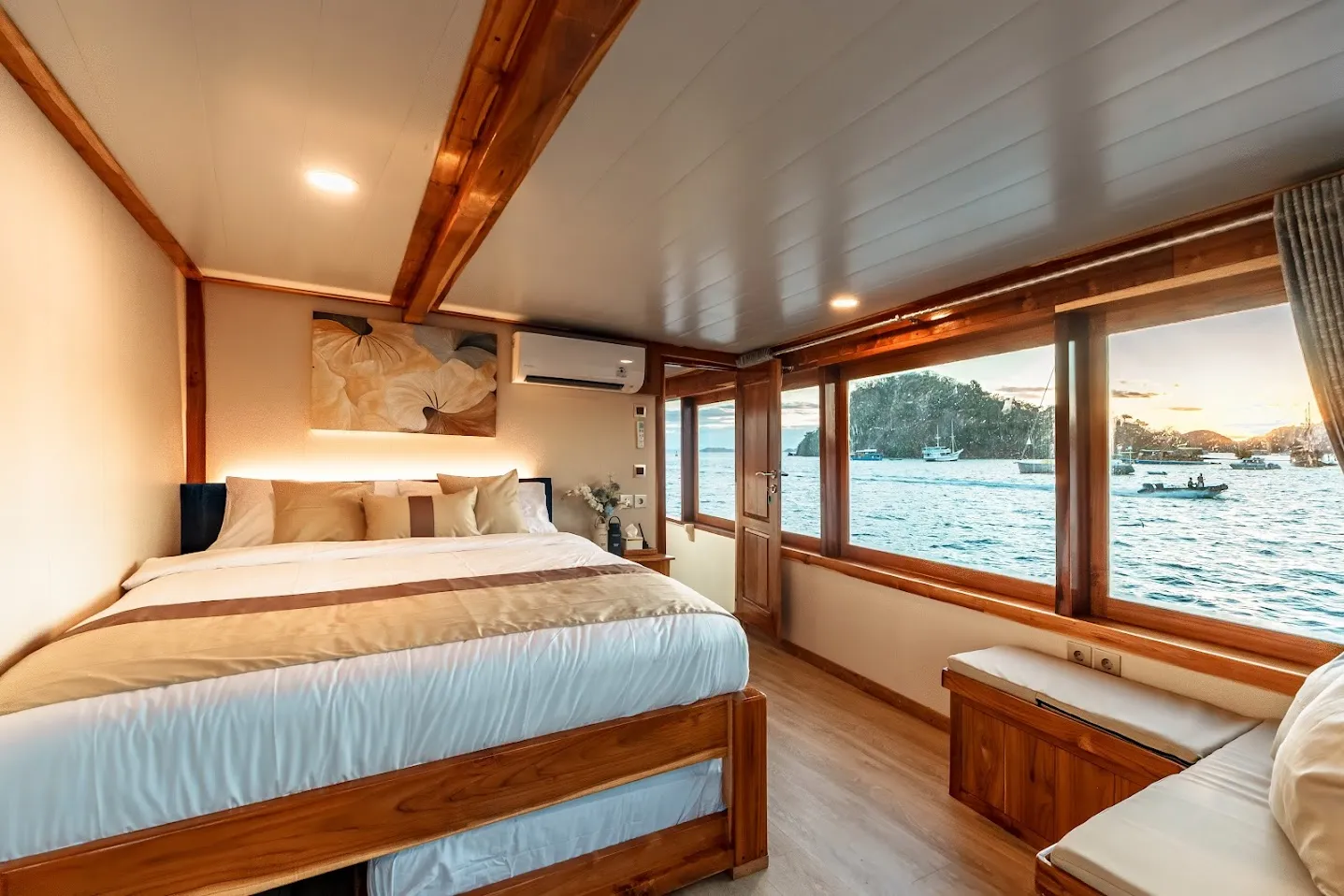 Master Cabin on Ayvara Cruise with queen bed and sea-view windows