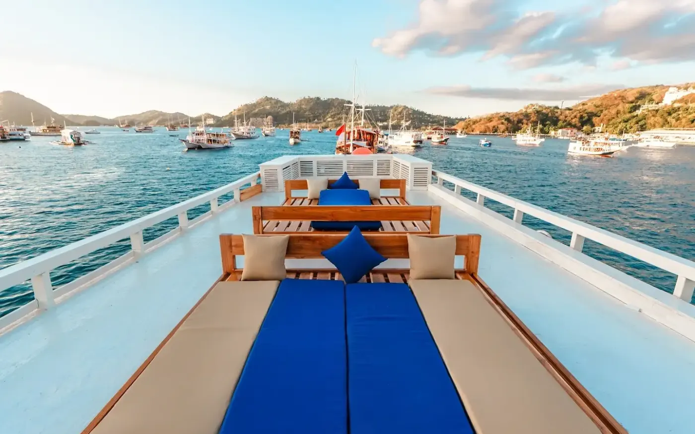 The 360-degree rooftop deck of Ayvara Cruise with sun loungers